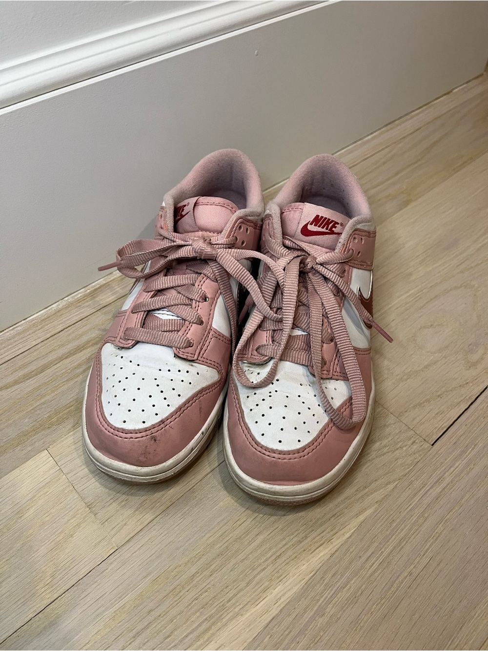 Nike Kids Pink and White Low-Top Sneakers with Swoosh